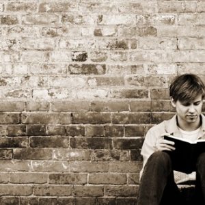 young-man-reading-964491_894279473